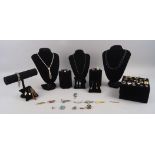 A group of jewellery to include a diamond and gem set butterfly brooch, mourning items, an agate