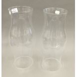 Two glass candle storm shades