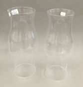 Two glass candle storm shades