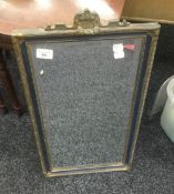 A gilt framed mirror