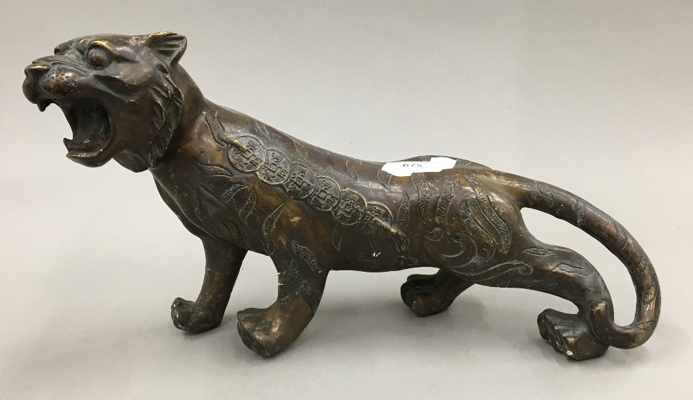 A bronze model of a tiger