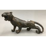 A bronze model of a tiger