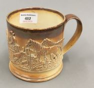 A 19th century salt glazed frog mug