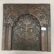 An 18th century carved oak panel