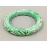 A Chinese carved jade bangle