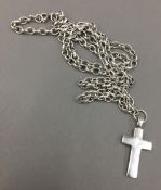 A silver crucifix on silver chain (29 grammes total weight)