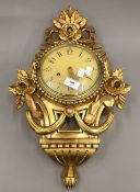 A gilt Cartel clock