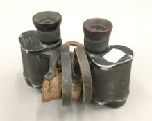 A pair of German WWII Dienstglas binoculars by Emil Busch 6x30 CXN with shoulder and button straps,