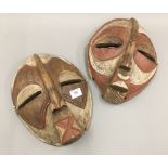 Two painted African tribal type wooden masks