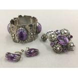 A Mexican silver mineral set bangle and earrings,