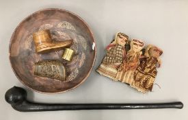 A quantity of ethnographic items, including a tribal club, a Chinese carved horn cup, etc.