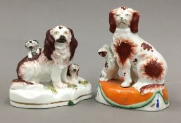 Two 19th century Staffordshire spaniel groups,