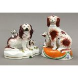 Two 19th century Staffordshire spaniel groups,
