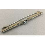 An Art Deco aquamarine set bar brooch (3 grammes total weight)