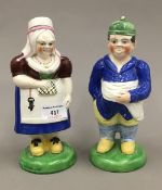 A pair of 19th century Staffordshire Prattware type figures