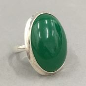 A silver and jade ring