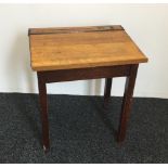 A vintage child's school desk