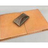 A leather desk pad and blotter