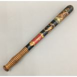 A Victorian painted truncheon