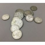 A quantity of assorted silver coins