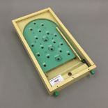 A boxed Chad Valley miniature bagatelle
