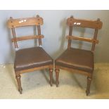A pair of Victorian oak framed Gothic side chairs