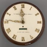 A Goldsmiths and Silversmiths Company Limited oak wall clock