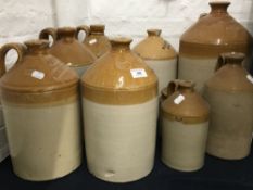 A quantity of stoneware beer flagons,