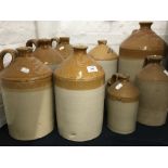 A quantity of stoneware beer flagons,