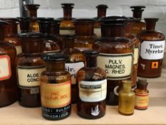 A quantity of approximately twenty apothecary bottles