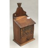 A 19th century cherrywood candle box