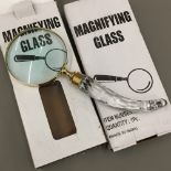 Two magnifying glasses