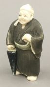 An early 20th century ivory netsuke