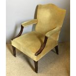 An 18th century and later mahogany framed Gainsborough armchair,