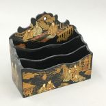 A Victorian chinoiserie decorated papier mache letter rack
