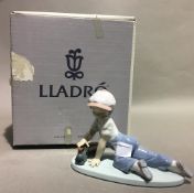 A boxed Lladro figure,
