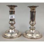 A pair of Sheffield plate telescopic candlesticks