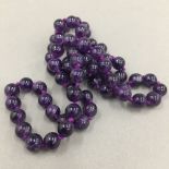 A string of amethyst beads