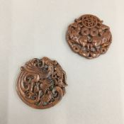 Two Chinese carved hardstone roundels