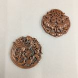 Two Chinese carved hardstone roundels