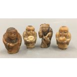 Four small carved netsukes