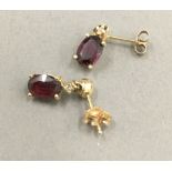 A pair of 14 ct gold diamond and ruby set drop earrings (1 gramme total weight)