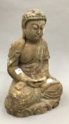 A wooden model of Buddha