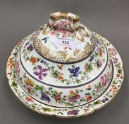 An early 19th century painted porcelain tureen and cover