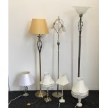 A quantity of floor standing and table lamps