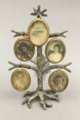 An early 20th century brass tree form photograph stand