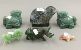 A pair or carved jade mythical beasts and other carved mineral and stone animals