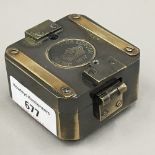 A square brass cased compass