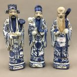A set of three Chinese porcelain figures