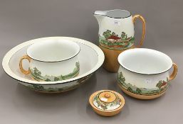 A five piece pottery wash set